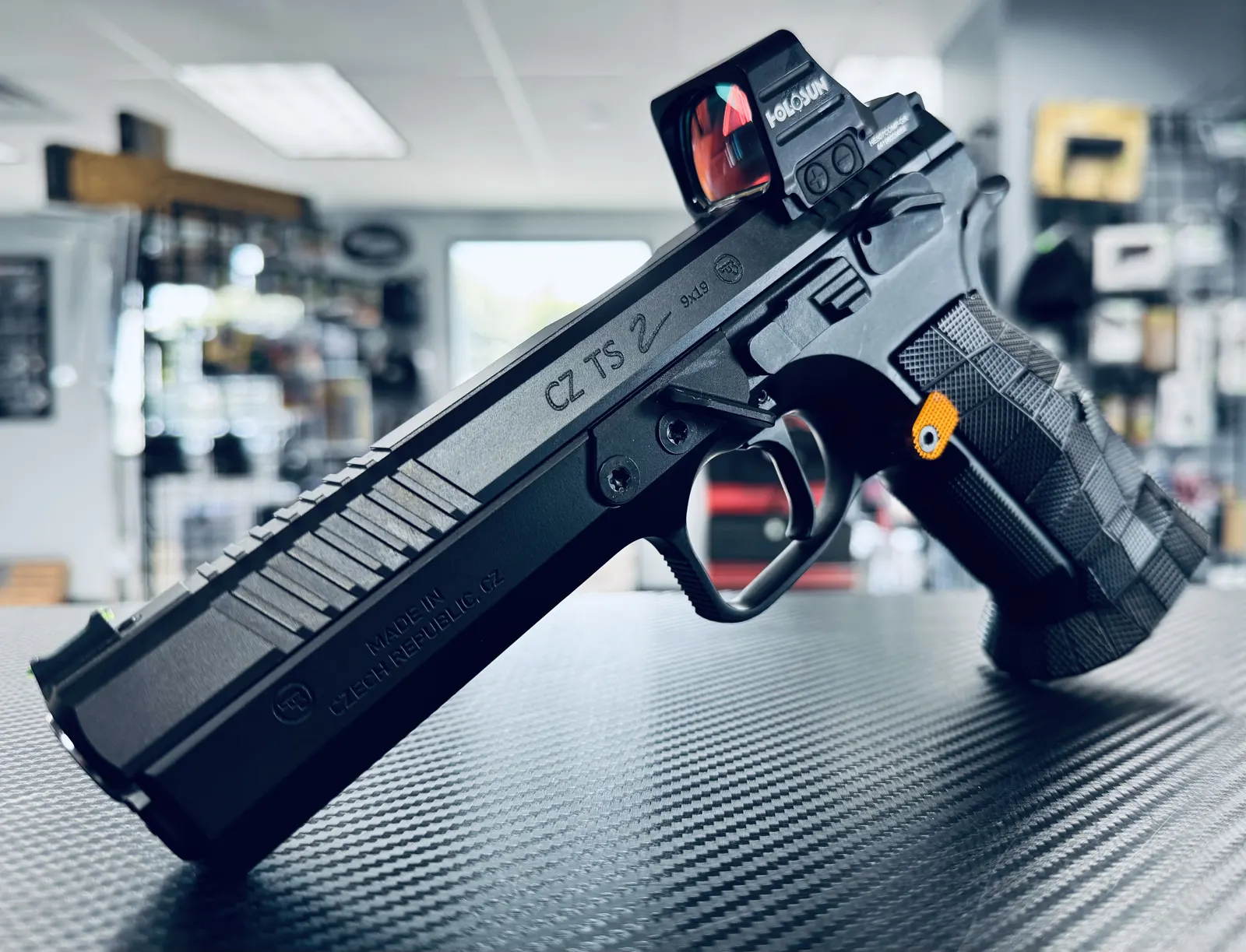 CZ competition pistol with red dot on the On Point counter
